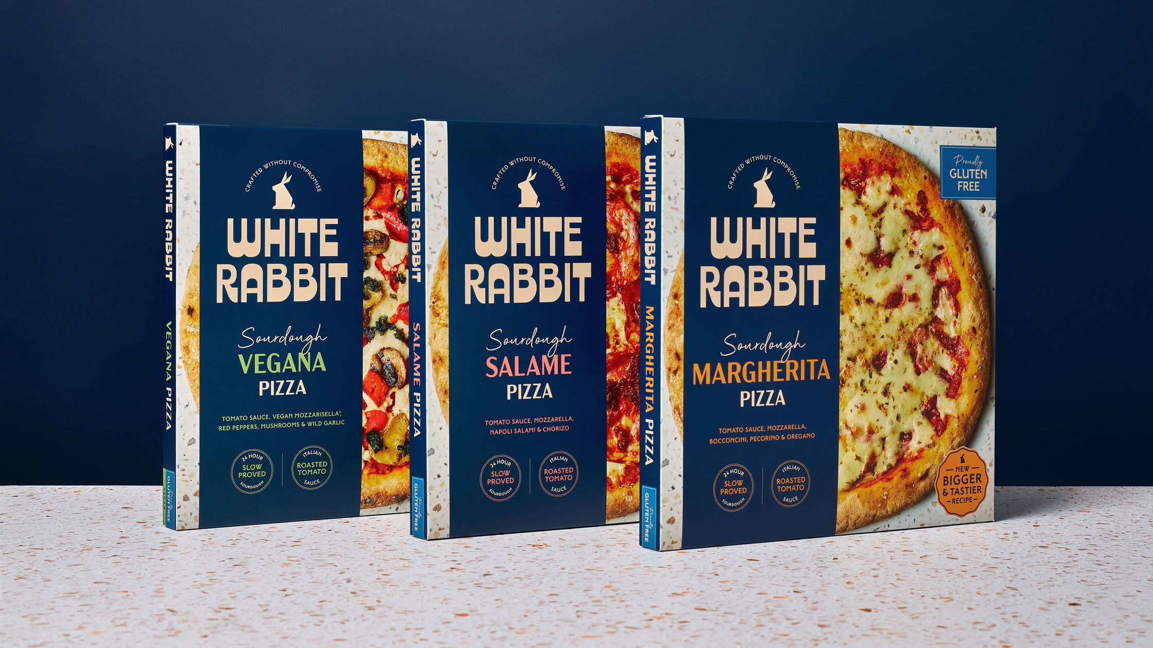 White Rabbit Pizza Co. packaging design showing redesigned pizza range in premium navy blue