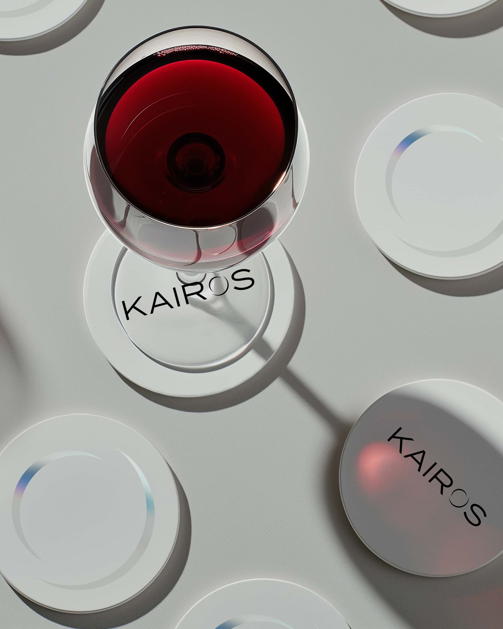 Kairos brand identity coasters as part of branded collateral