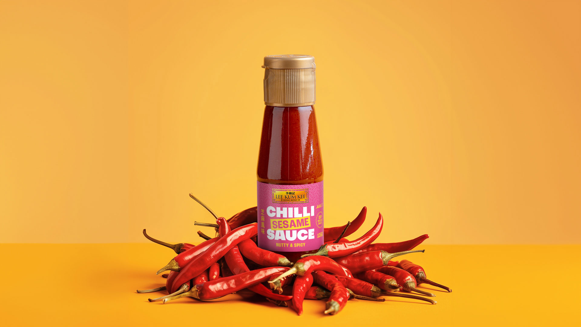 Lee Kum Kee chilli sauce packaging design bottles styled with fresh chilli peppers