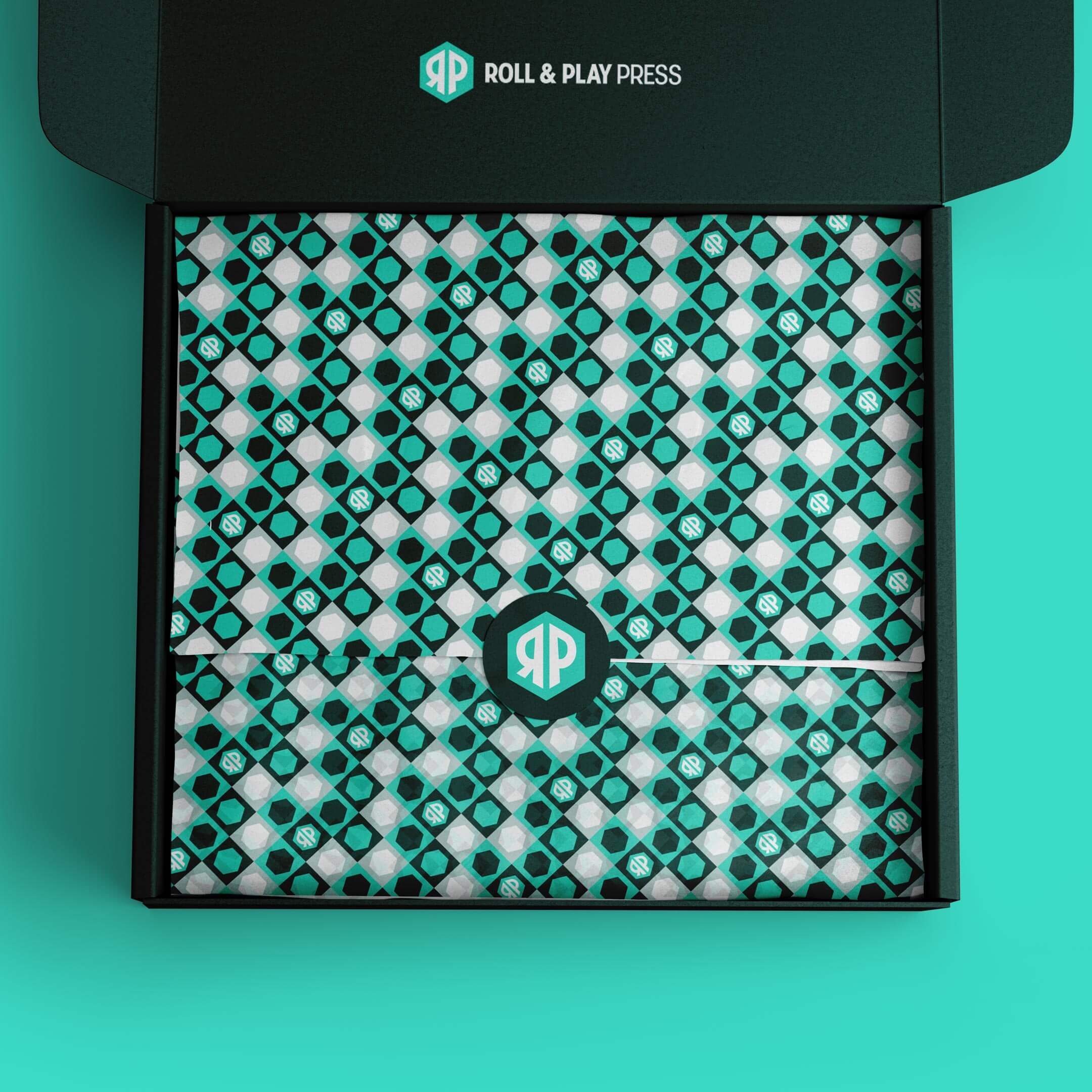 Roll and Play Press brand identity tissue paper packaging