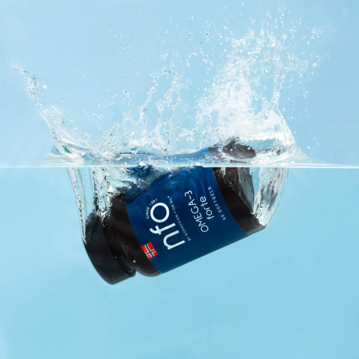 NFO Vitamins capsule shot with sculptural lighting and minimal composition